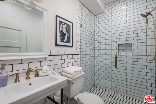 a bathroom with a sink and a toilet
