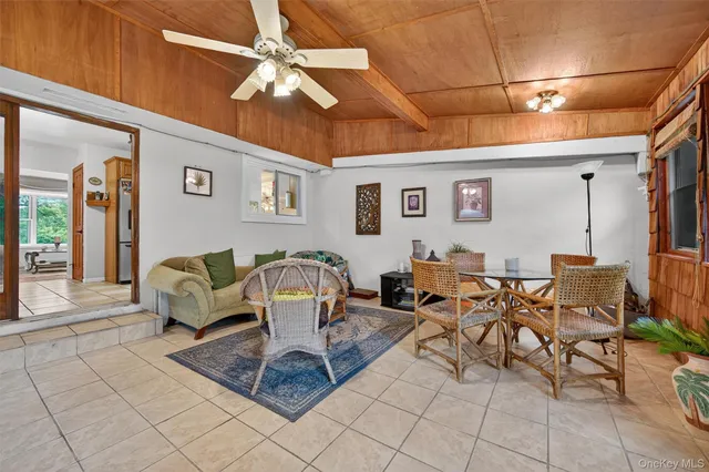 a living room with furniture and a table