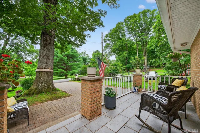 a view of a terrace with furniture
