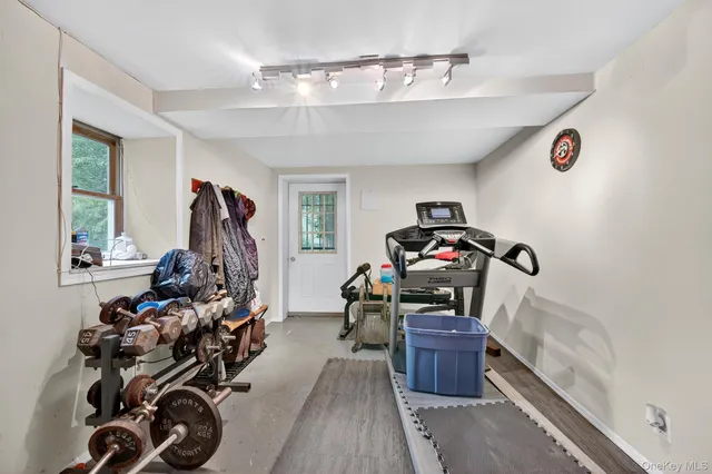 a view of a room with gym equipment