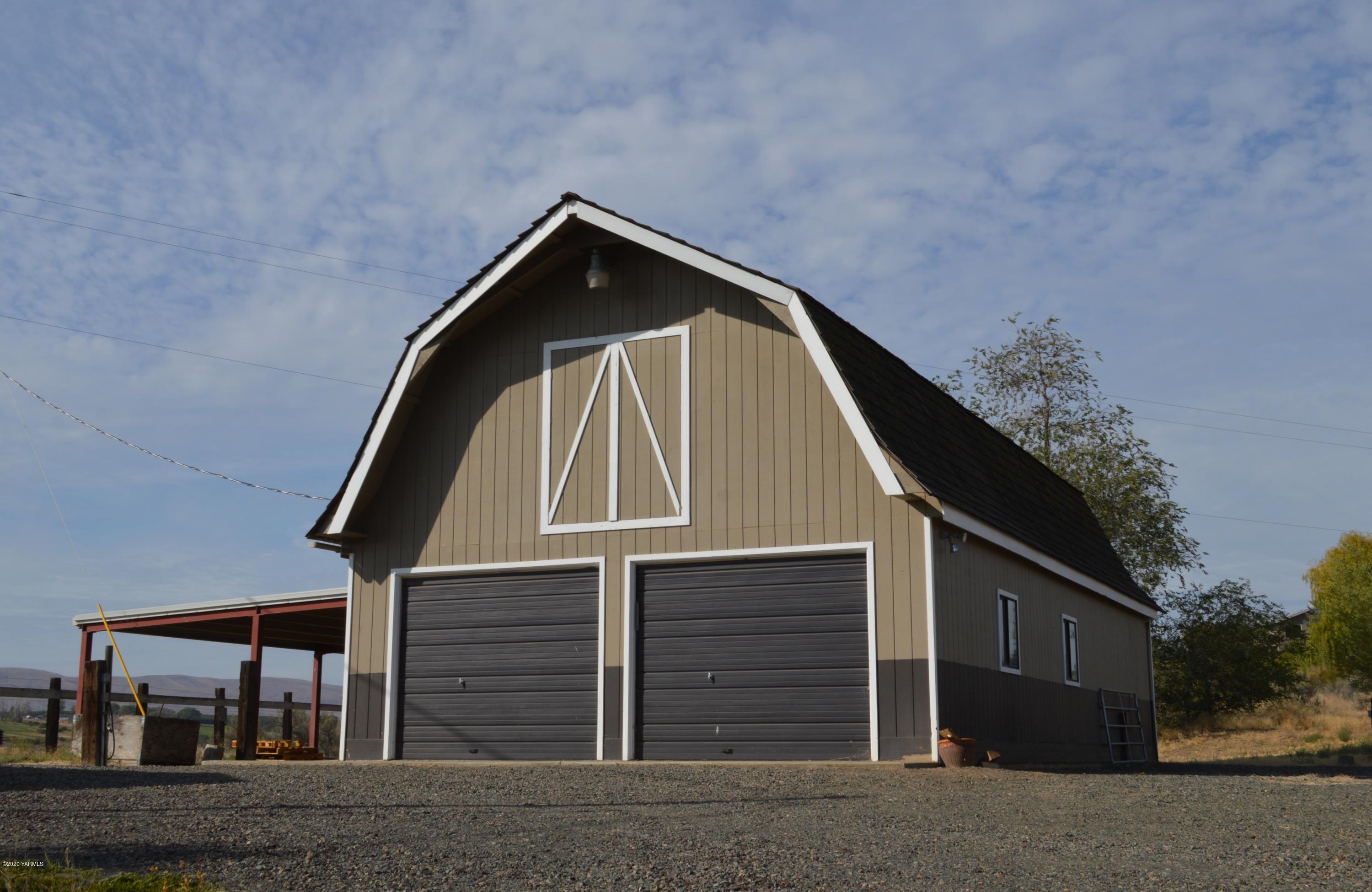 250 West Canyon Road Yakima, WA 98908 - Photo 2 of 27 a view of a house with a door