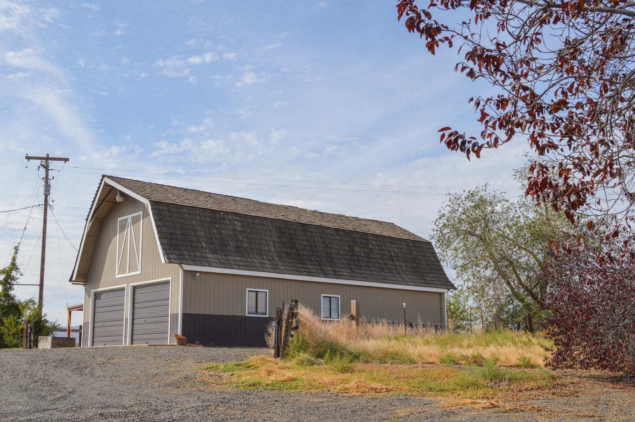 250 West Canyon Road Yakima, WA 98908 - Photo 18 of 27 a front view of a house with a yard