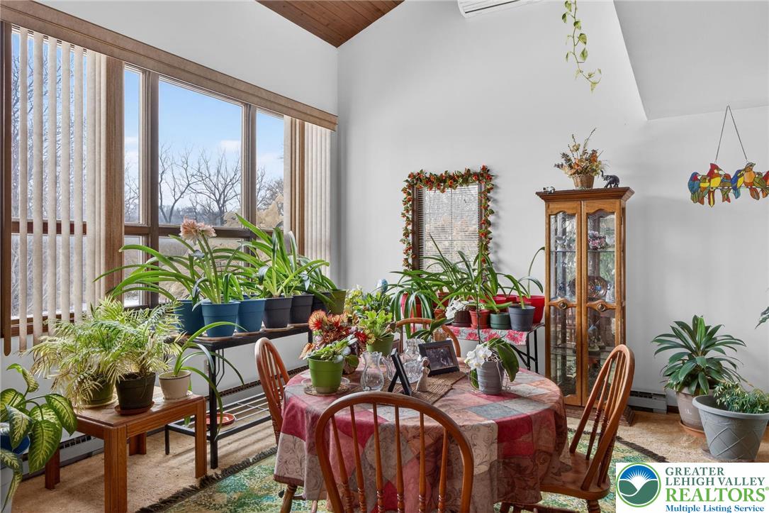 4793 Main Road West Emmaus, PA 18049 - Photo 31 of 81 a view of a dining room with furniture window and outdoor view