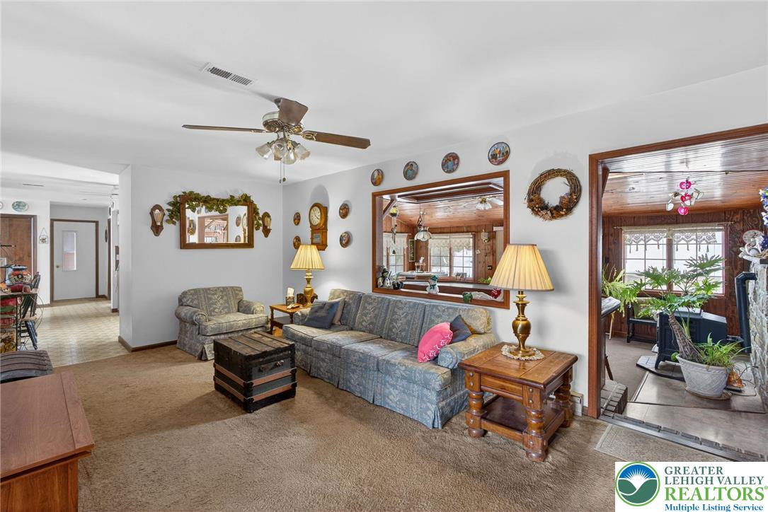 4793 Main Road West Emmaus, PA 18049 - Photo 37 of 81 a living room with furniture and a flat screen tv