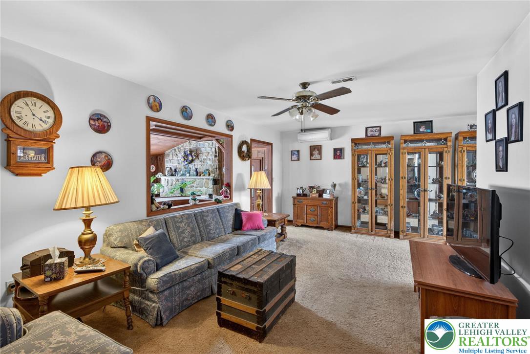 4793 Main Road West Emmaus, PA 18049 - Photo 39 of 81 a living room with furniture and a flat screen tv