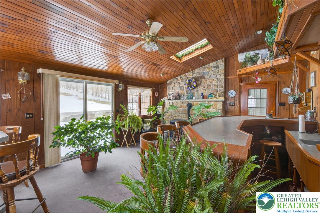 4793 Main Road West Emmaus, PA 18049 - Photo 46 of 81 a view of a porch with chairs and potted plants