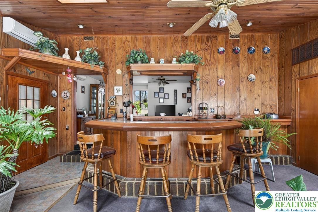 4793 Main Road West Emmaus, PA 18049 - Photo 48 of 81 a large building with a table and chairs