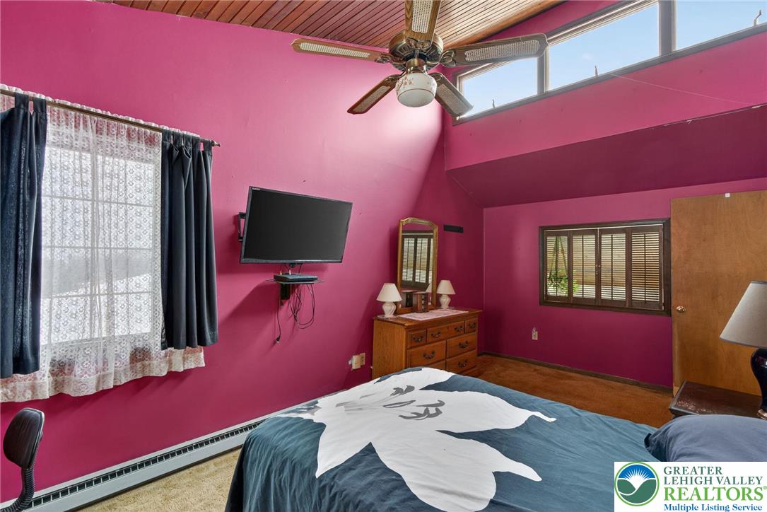 4793 Main Road West Emmaus, PA 18049 - Photo 66 of 81 a bedroom with a bed and a flat screen tv