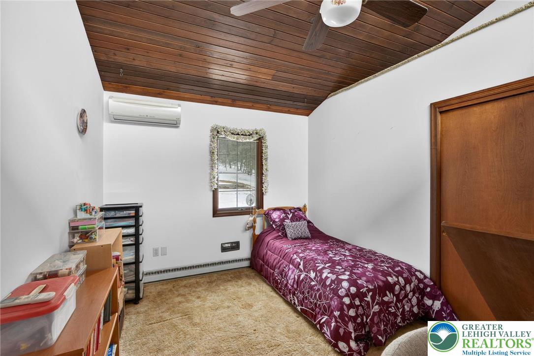 4793 Main Road West Emmaus, PA 18049 - Photo 67 of 81 a bedroom with a bed and a window