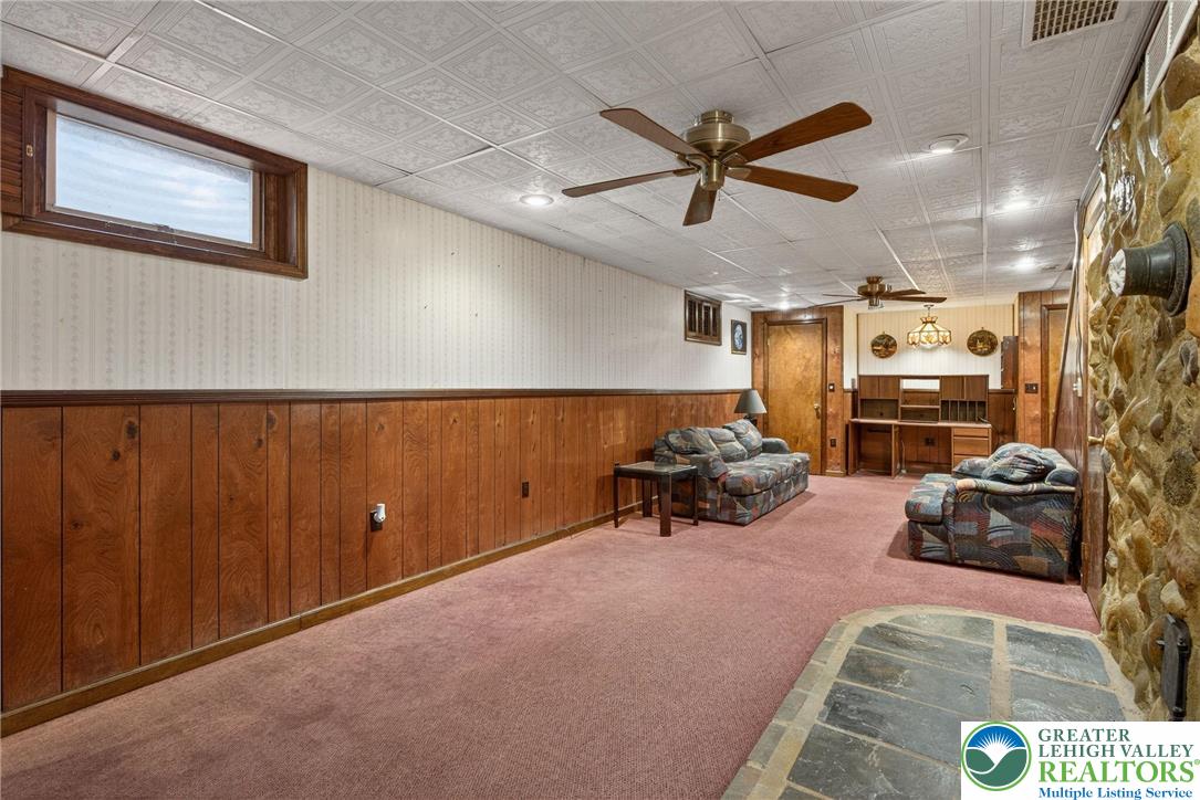 4793 Main Road West Emmaus, PA 18049 - Photo 77 of 81 a view of a livingroom with furniture and a ceiling fan