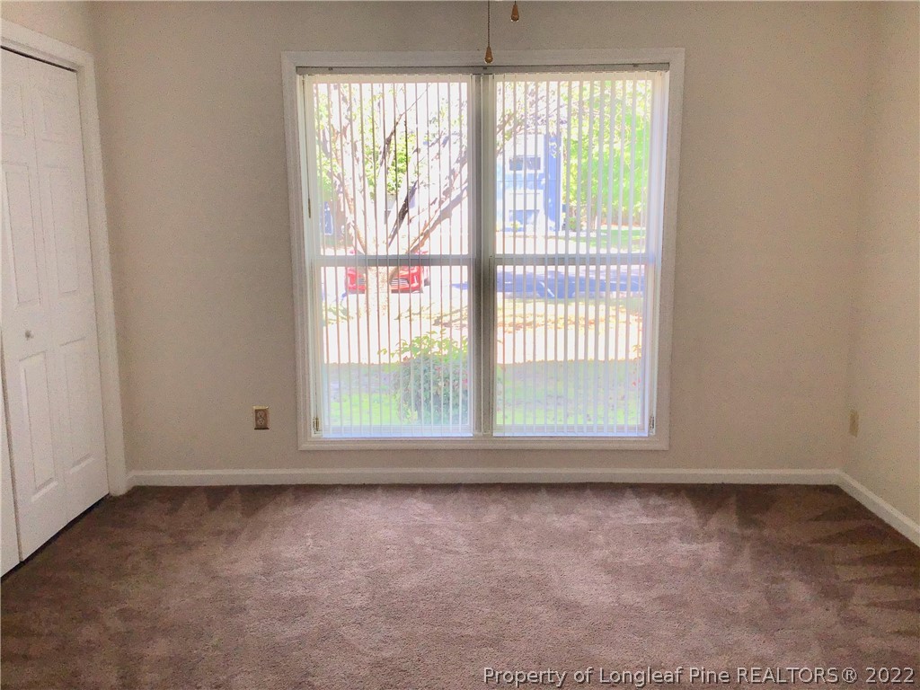 1824 Sardonyx Road, Unit 2 Fayetteville, NC 28303 - Photo 14 of 20 an empty room with a window
