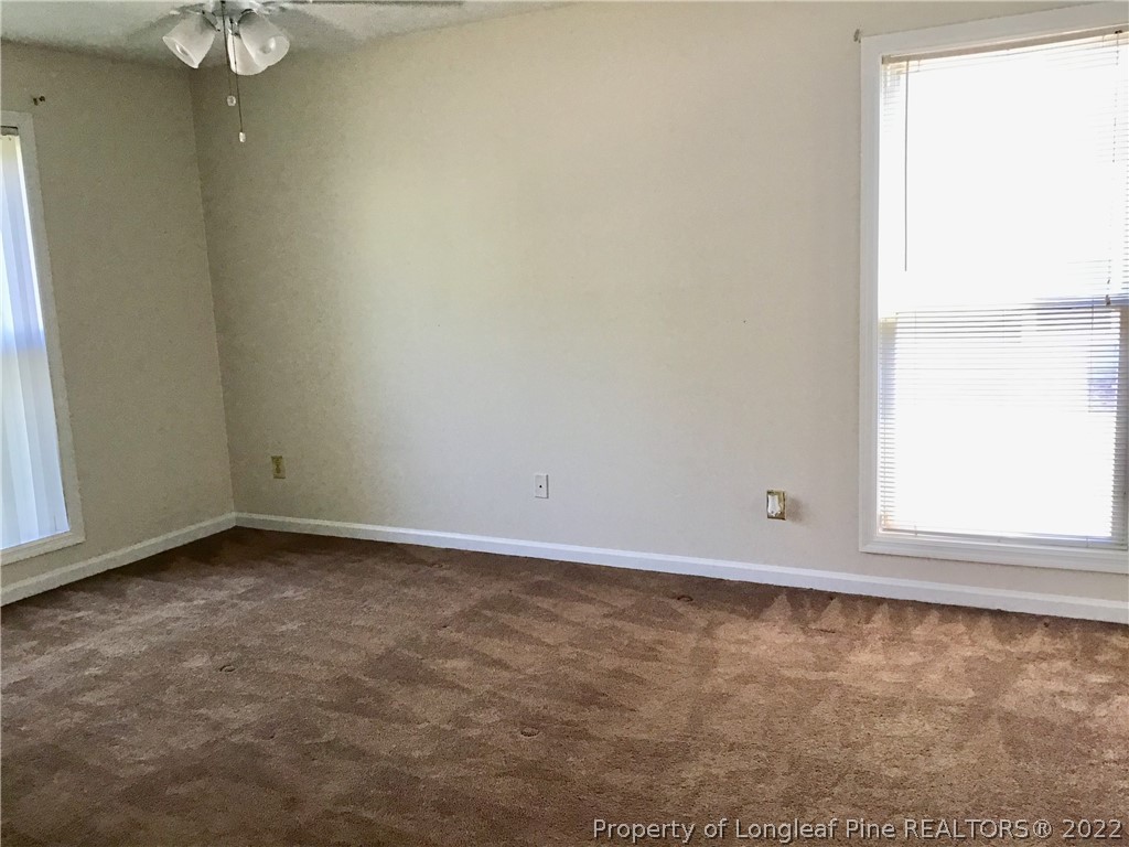 1824 Sardonyx Road, Unit 2 Fayetteville, NC 28303 - Photo 16 of 20 an empty room with a window
