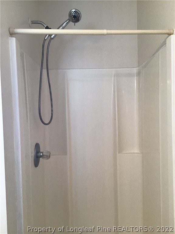 1824 Sardonyx Road, Unit 2 Fayetteville, NC 28303 - Photo 20 of 20 a bathroom with a shower
