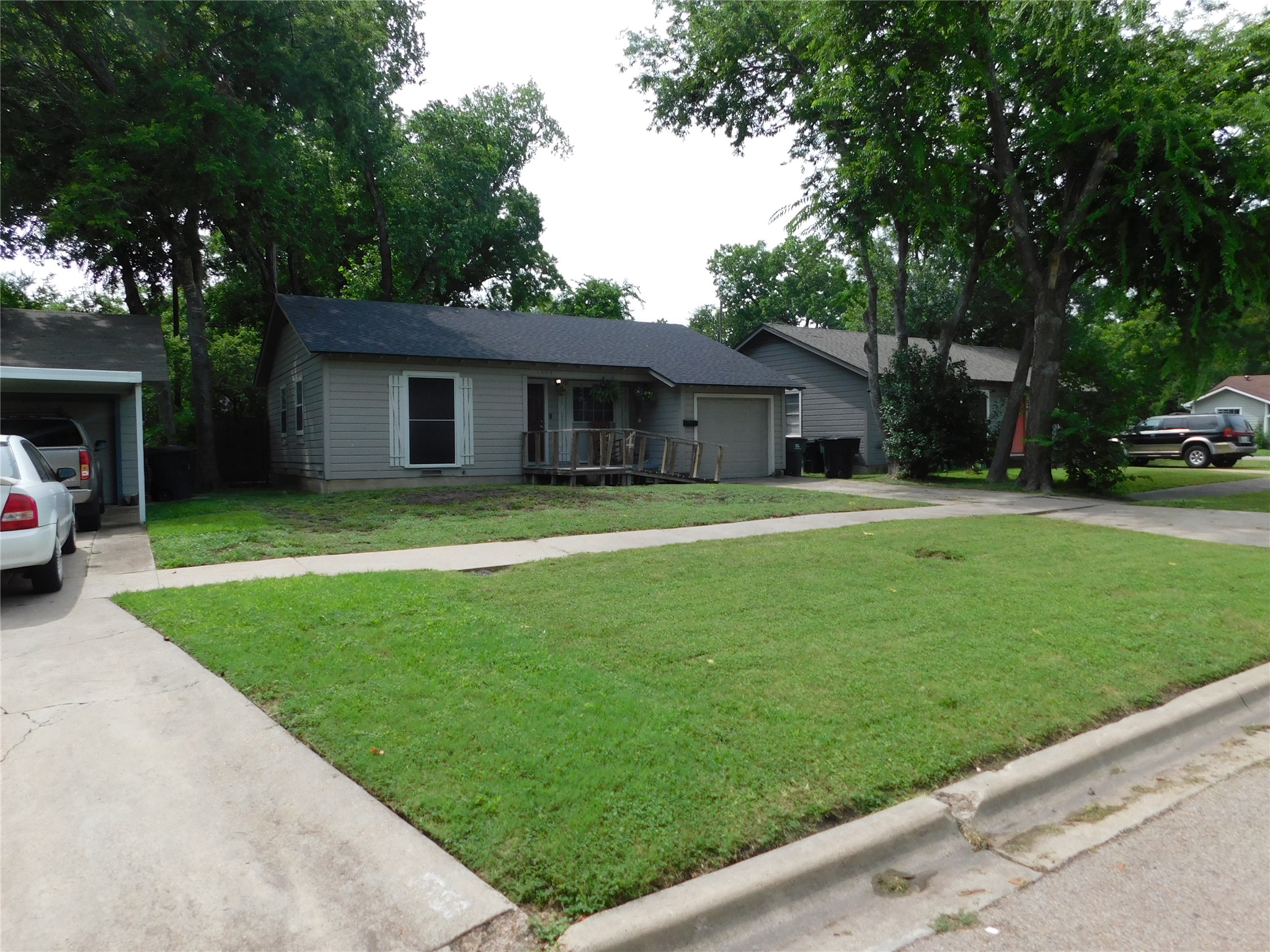 1304 South 19th Street Temple, TX 76504 - Photo 3 of 6 a view of a house with a yard and tree s