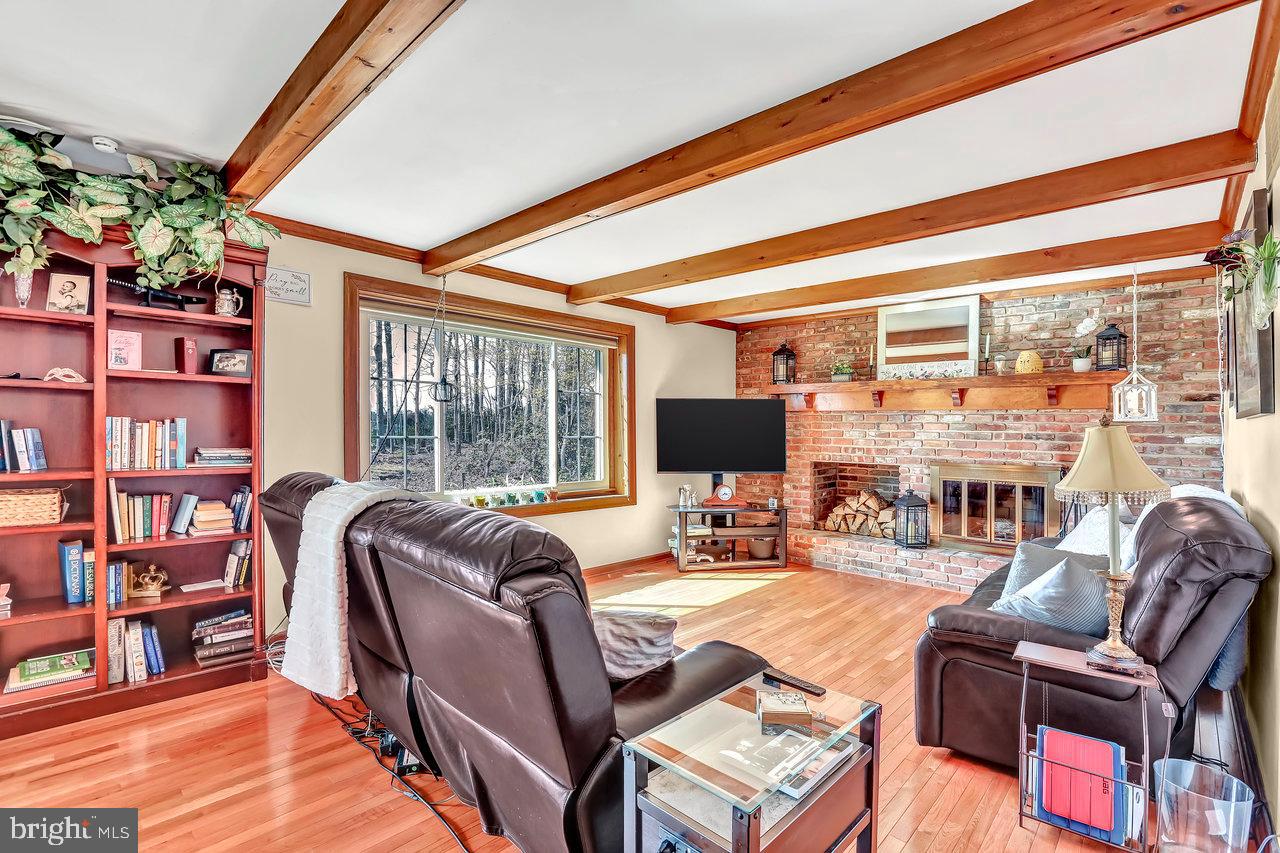 1 Washington Way Tabernacle, NJ 08088 - Photo 12 of 37 a living room with fireplace furniture and a flat screen tv