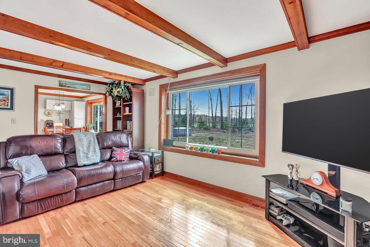 1 Washington Way Tabernacle, NJ 08088 - Photo 13 of 37 a living room with furniture and a flat screen tv
