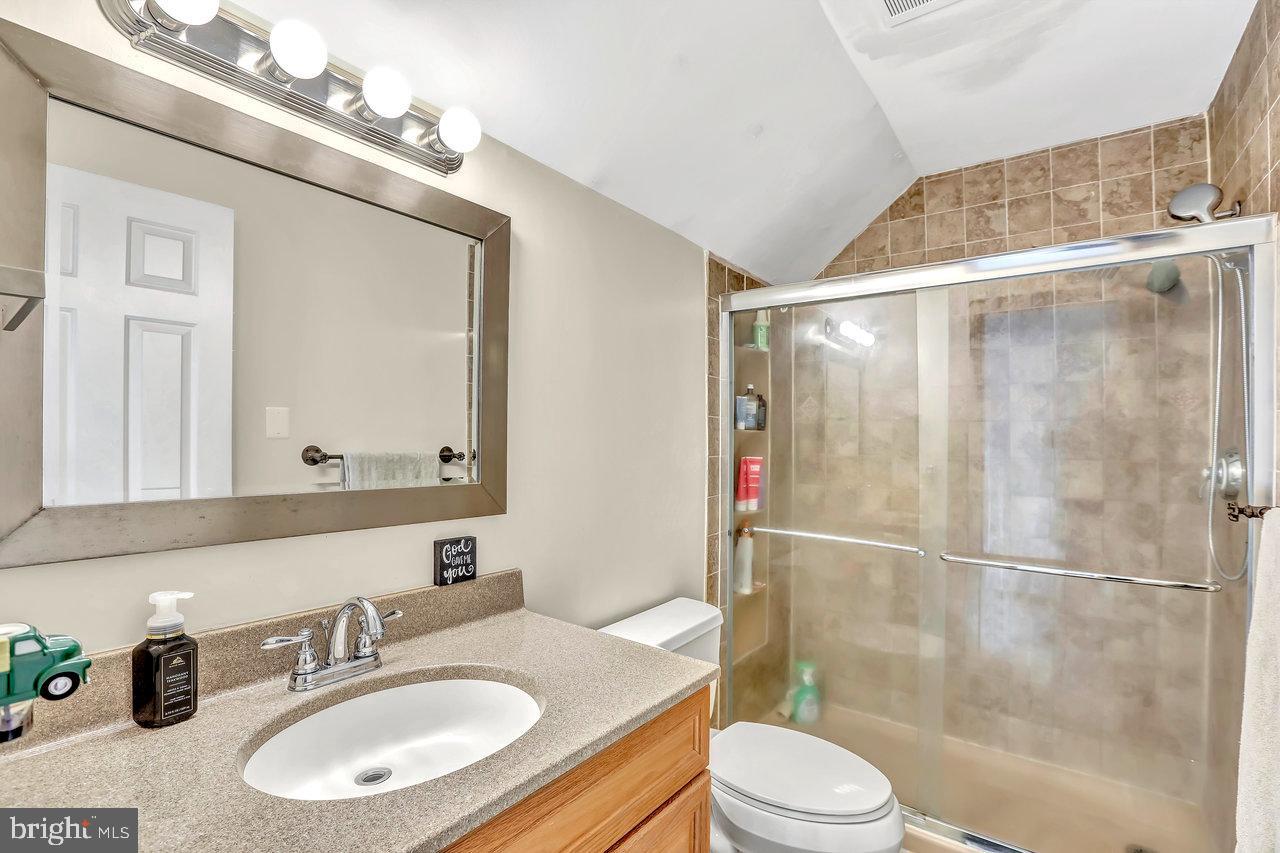 1 Washington Way Tabernacle, NJ 08088 - Photo 23 of 37 a bathroom with a sink toilet a mirror and shower