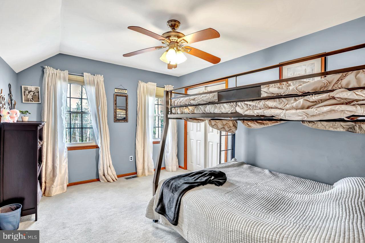 1 Washington Way Tabernacle, NJ 08088 - Photo 29 of 37 a bedroom with a bed and a ceiling fan