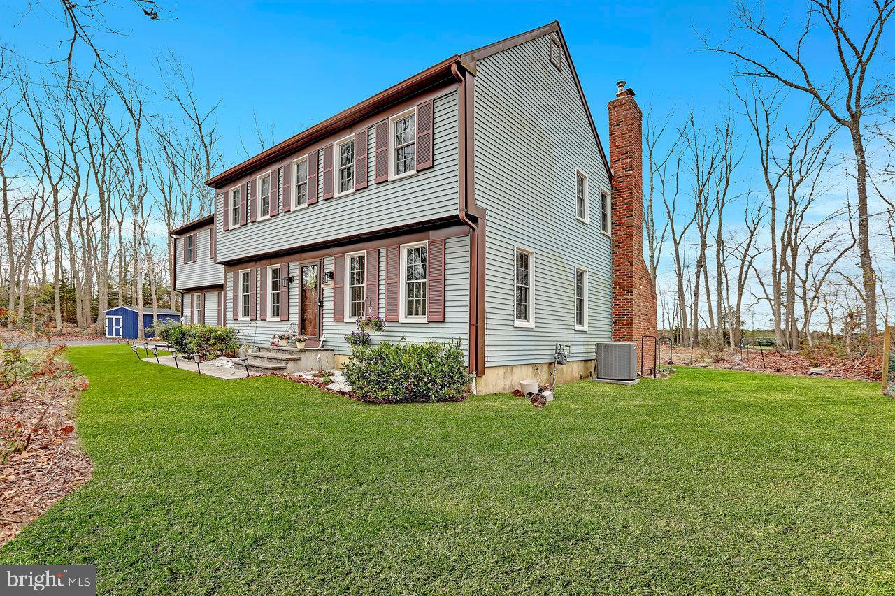 1 Washington Way Tabernacle, NJ 08088 - Photo 3 of 37 a front view of a house with garden and porch