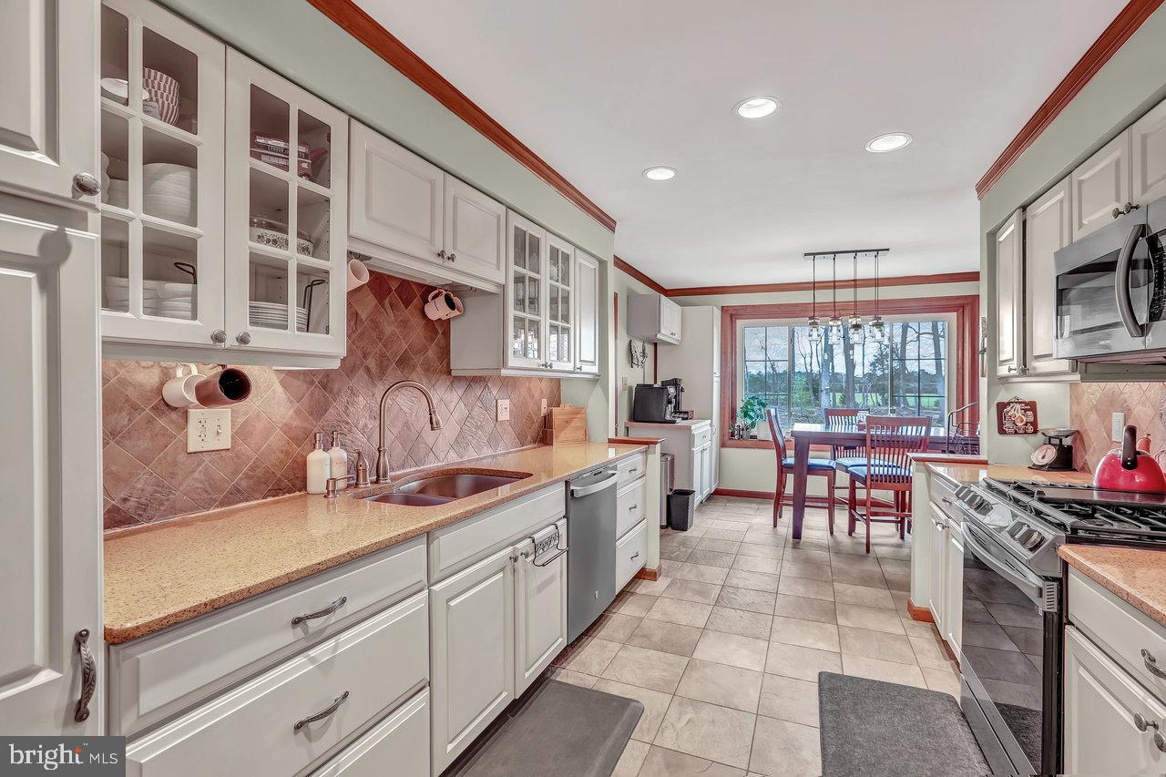 1 Washington Way Tabernacle, NJ 08088 - Photo 5 of 37 a open kitchen with stainless steel appliances granite countertop a stove and a sink