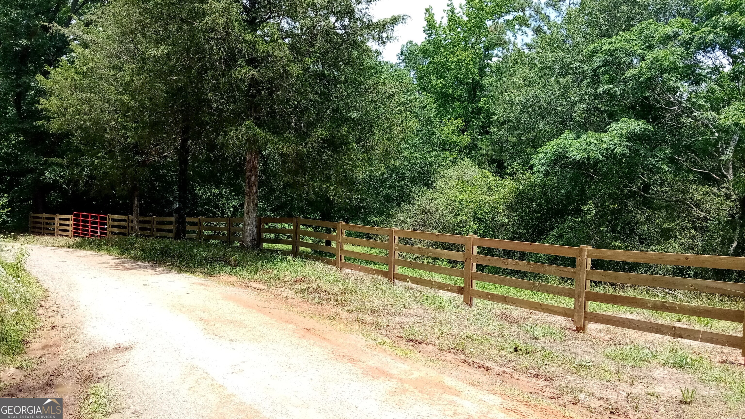 2563 Quill Road Bowman, GA 30624 - Photo 1 of 1 a view of backyard with wooden fence