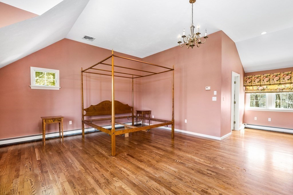 78 Paul Road Hanover, MA 02339 - Photo 17 of 42 a view of a room with wooden floor table and chairs