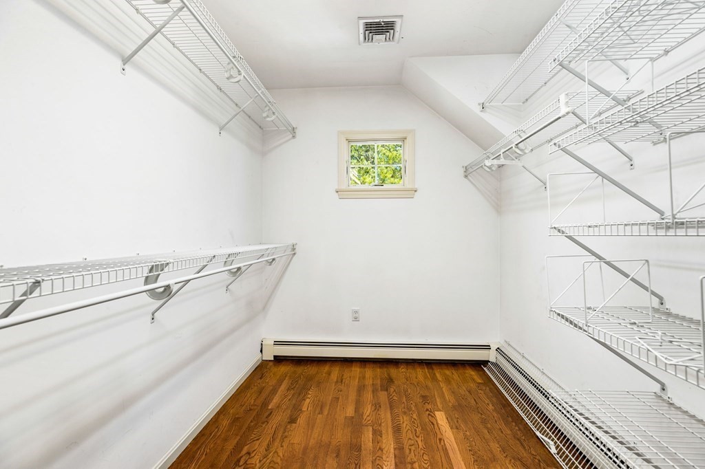 78 Paul Road Hanover, MA 02339 - Photo 20 of 42 a view of a room with racks on the wall