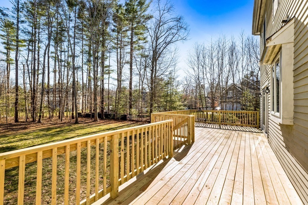 78 Paul Road Hanover, MA 02339 - Photo 33 of 42 a view of balcony with wooden floor and fence
