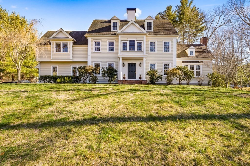 78 Paul Road Hanover, MA 02339 - Photo 38 of 42 a front view of a house with a swimming pool