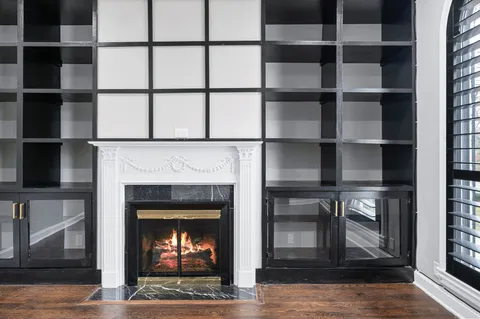 a view of a balcony with wooden fence