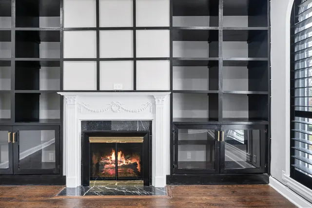 a view of a balcony with wooden fence