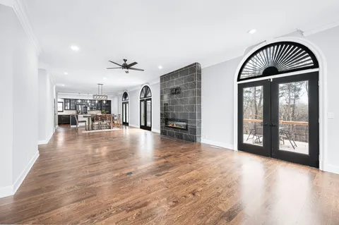 a view of a bathroom with a bathtub and shower