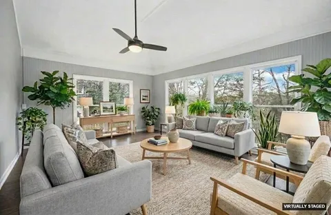 a kitchen with stainless steel appliances a stove microwave and a refrigerator