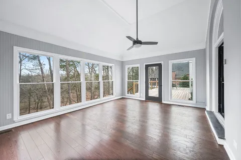 a kitchen with stainless steel appliances a refrigerator and microwave