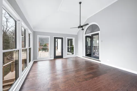 a bed room with bed and wooden floor
