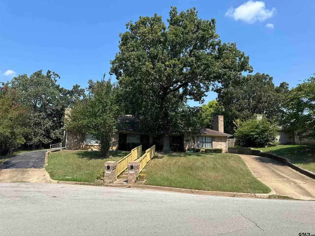 a view of a chairs and tables in the patio