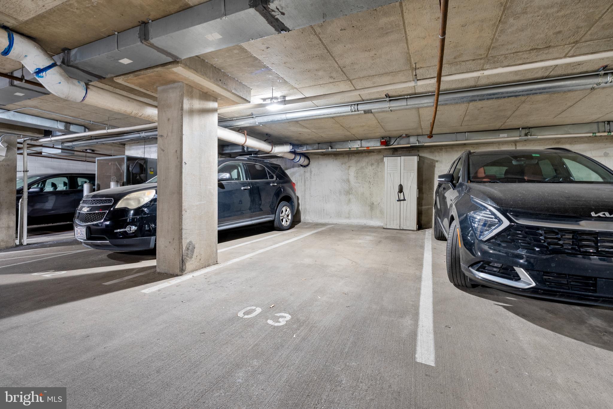150 V Street Northwest, Unit V204 Washington, DC 20001 - Photo 24 of 26 a view of parking garage with cars