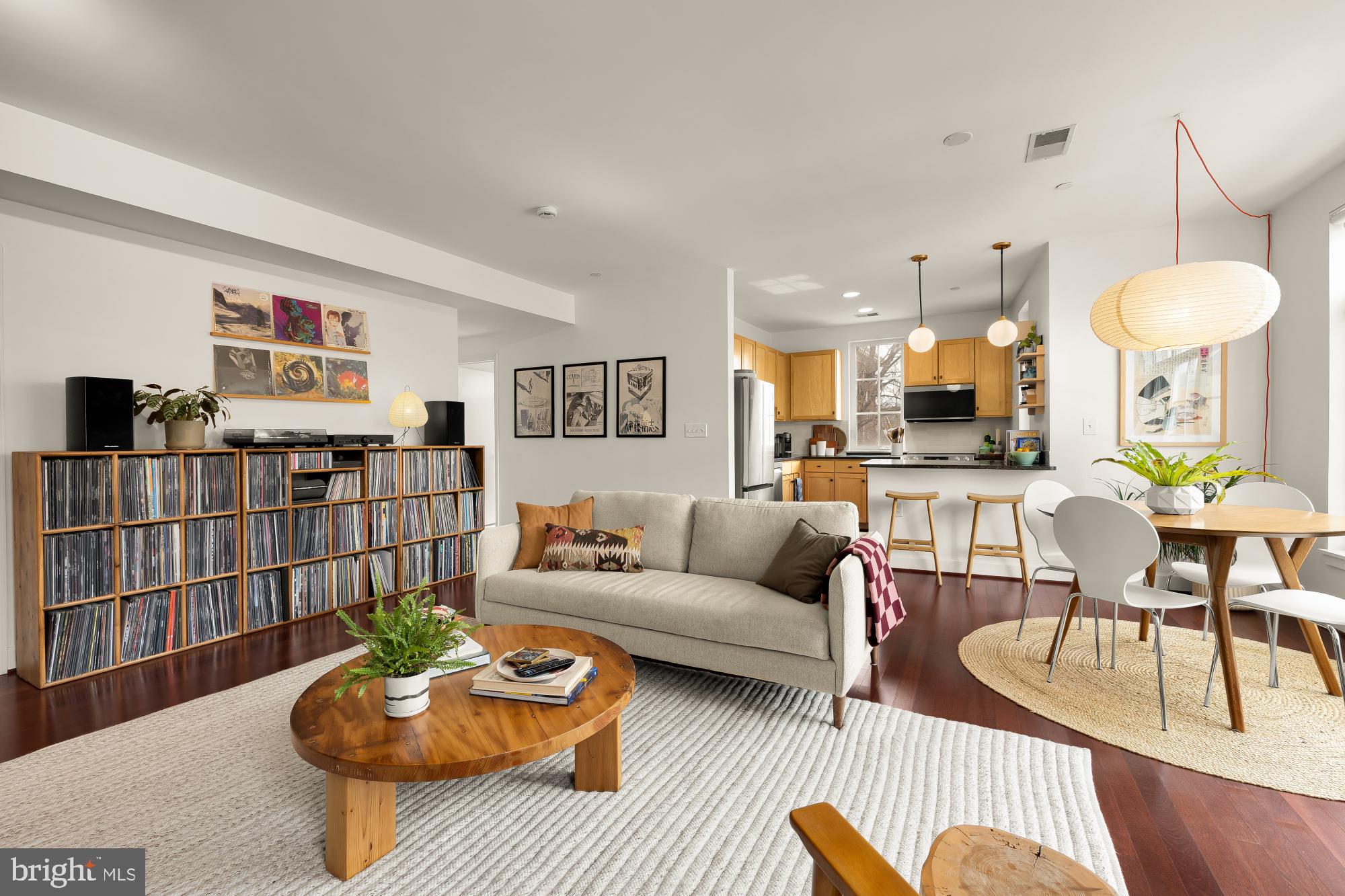 150 V Street Northwest, Unit V204 Washington, DC 20001 - Photo 3 of 26 a living room with furniture kitchen and a table