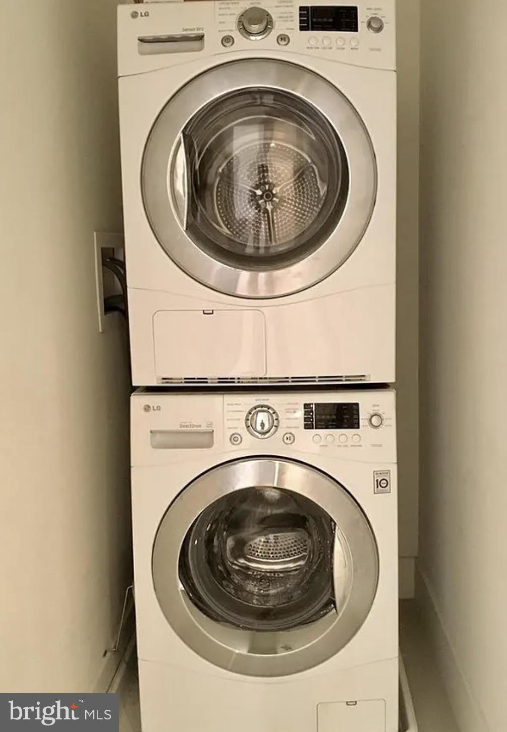 300 Cathedral Street, Unit 106 Baltimore, MD 21201 - Photo 12 of 16 a utility room with dryer and washer