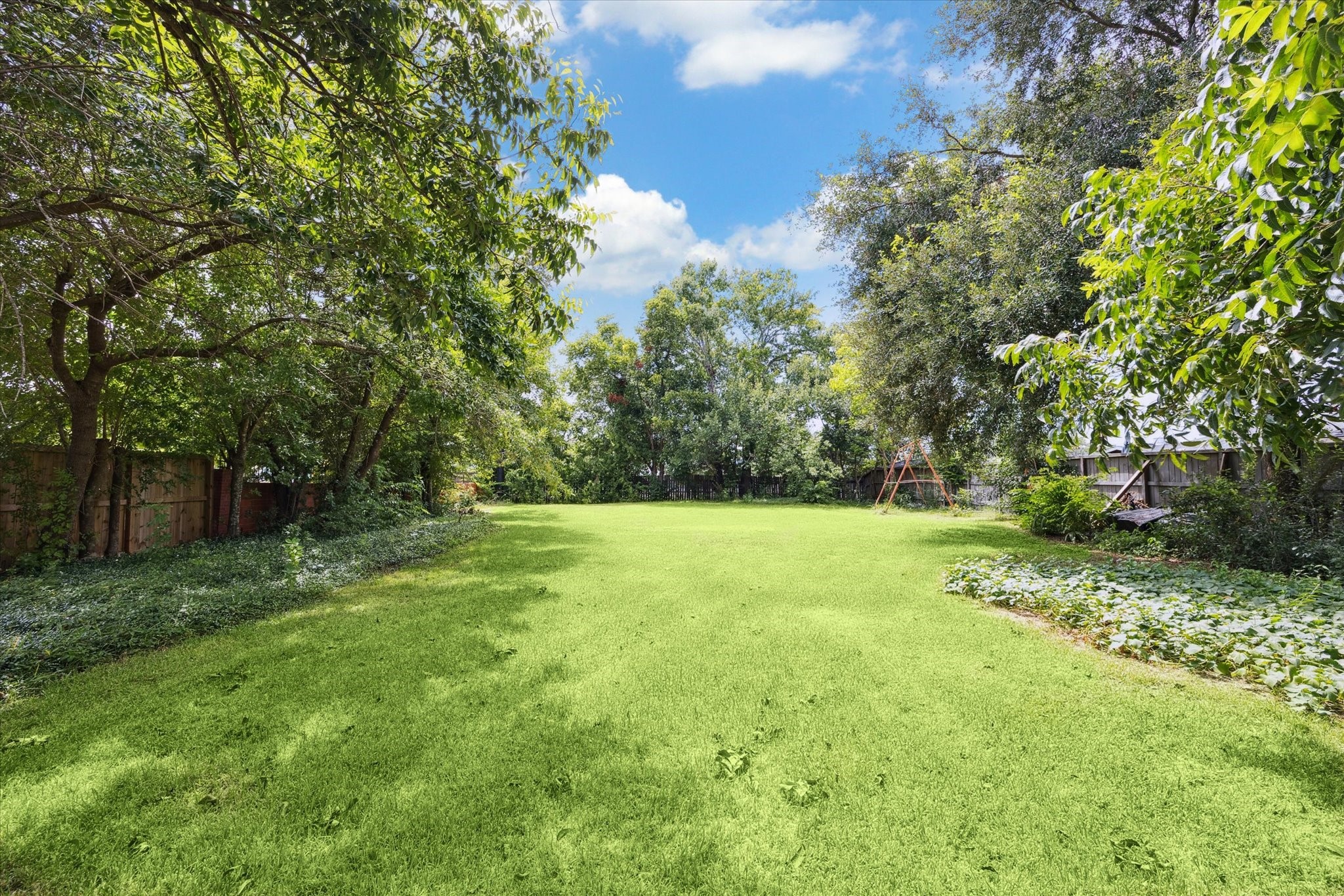 8606 Linkpass Lane Houston, TX 77025 - Photo 1 of 4 a view of backyard with green space
