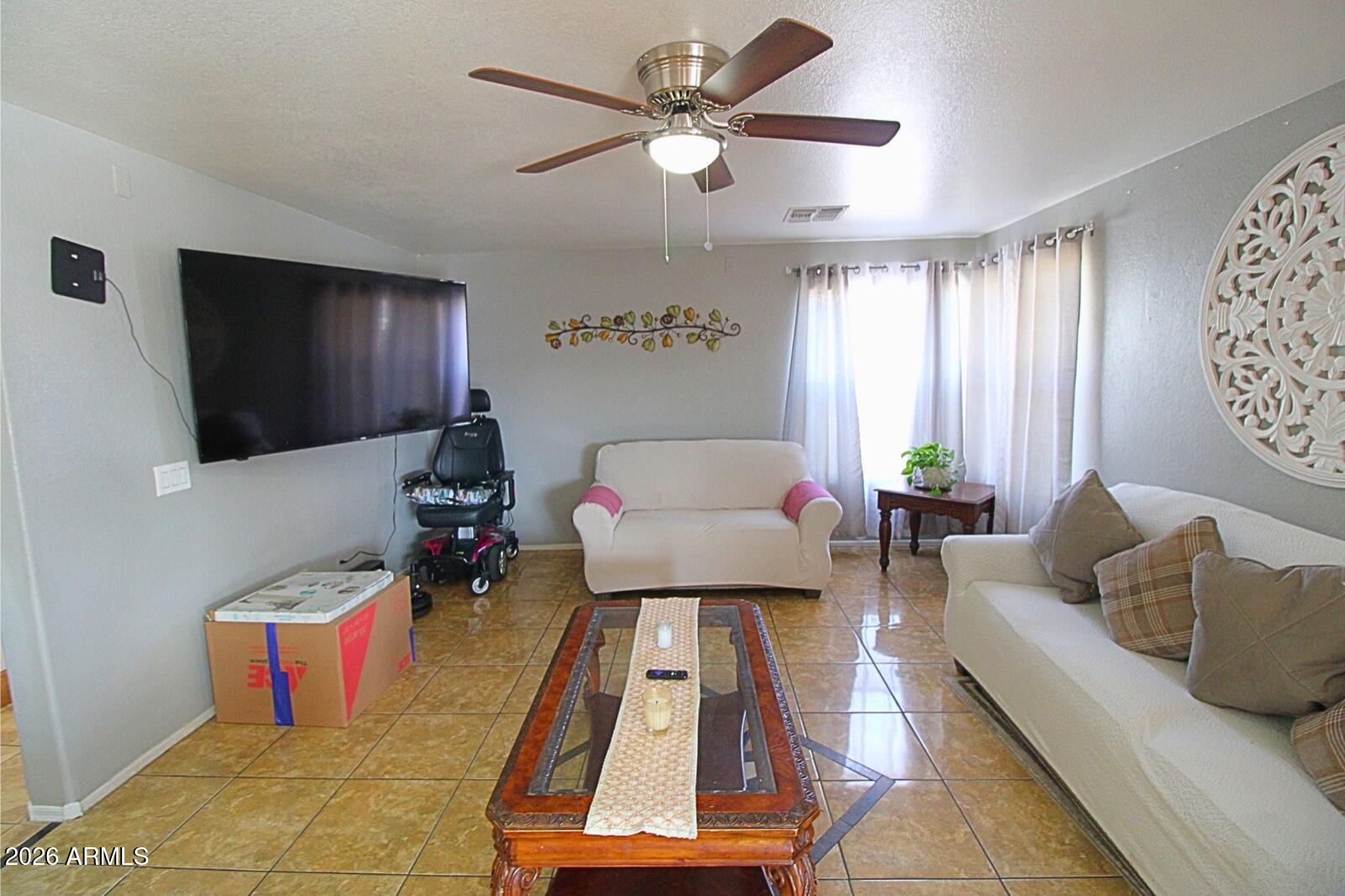 8565 West Monte Vista Road Phoenix, AZ 85037 - Photo 4 of 22 PHOTO-2026-04-27-03-12-38
