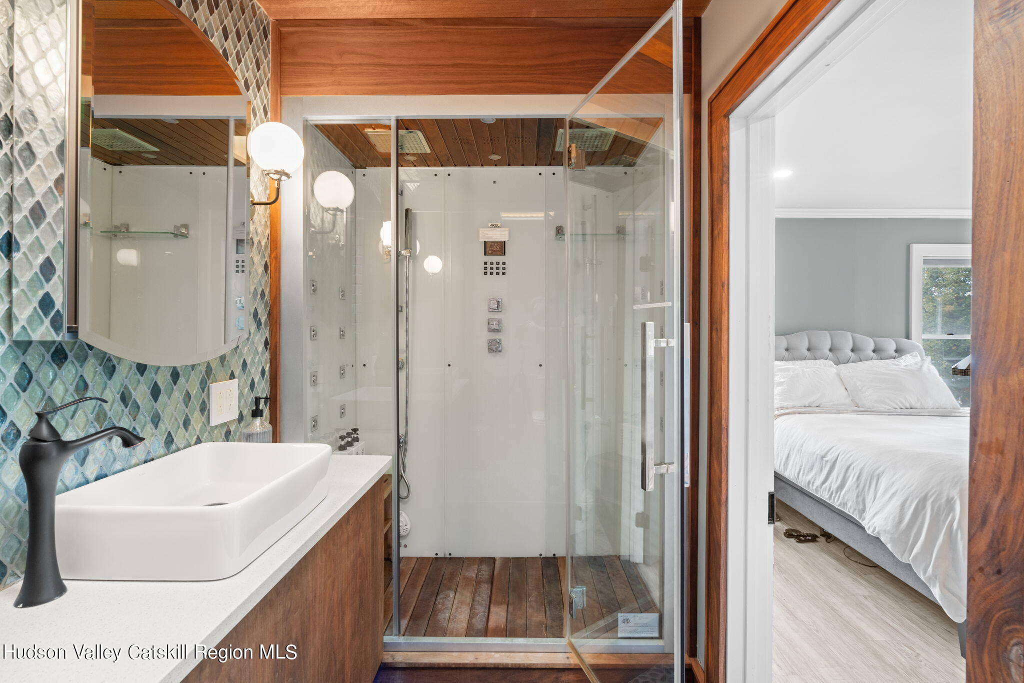 1765 Highway 213 Rifton, NY 12471 - Photo 15 of 33 a en suite bathroom with a sink a mirror and shower