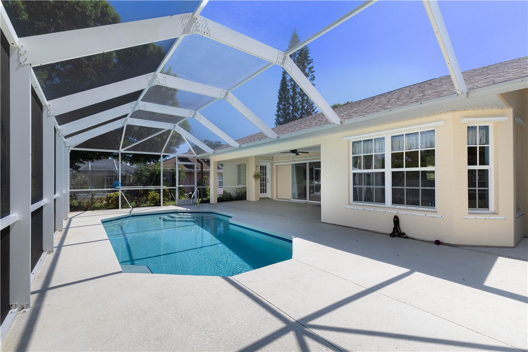 414 Ash Street Sebastian, FL 32958 - Photo 32 of 36 a view of a building with a swimming pool
