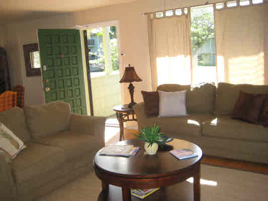 3780 Edward Road, Unit 5201 Princeville, HI 96722 - Photo 11 of 23 a living room with furniture and a large window
