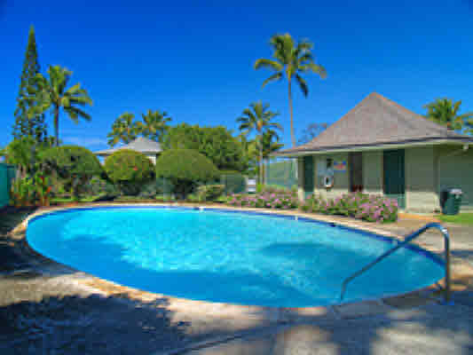 3780 Edward Road, Unit 5201 Princeville, HI 96722 - Photo 5 of 23 a view of a swimming pool with a yard