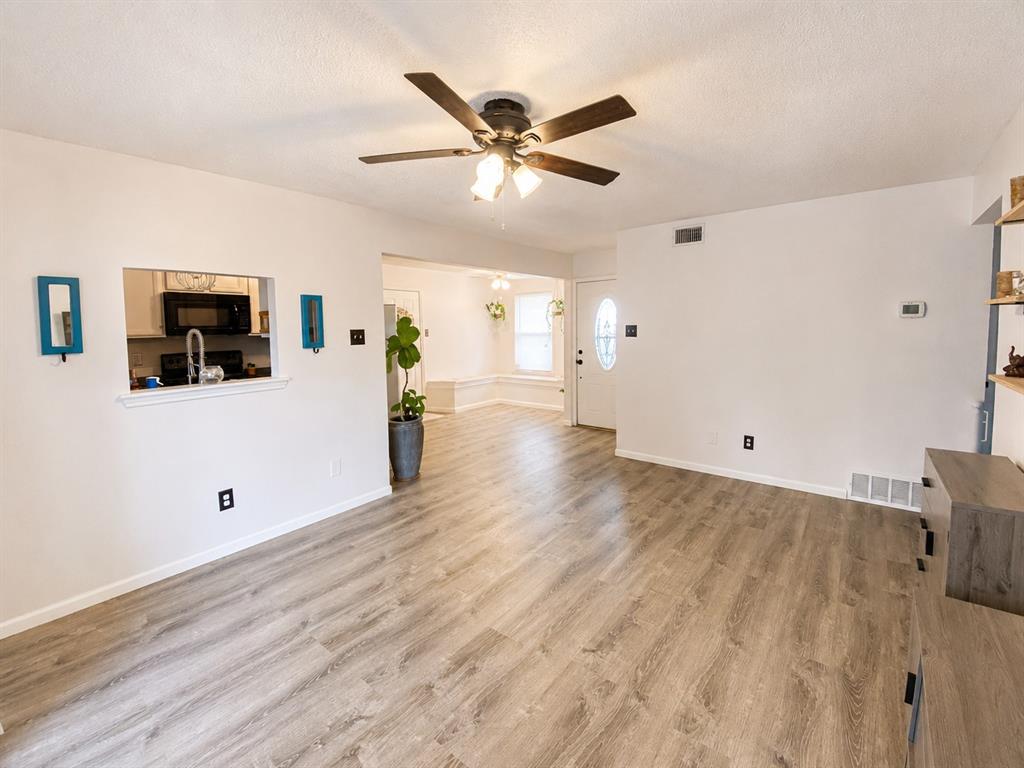 404 Old Mansfield Road Keene, TX 76059 - Photo 6 of 33 Living Area and eating area towards front door