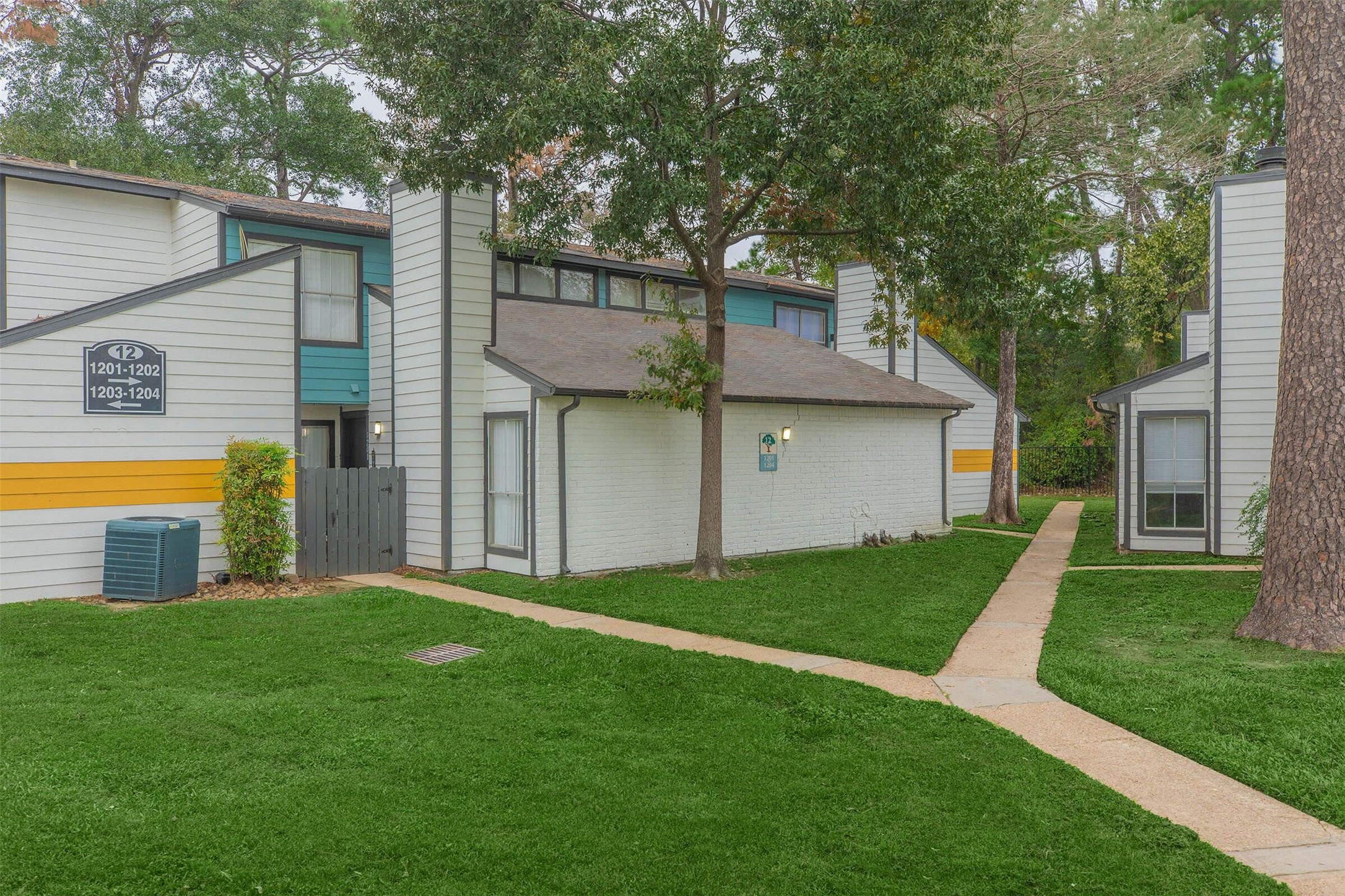 21717 Inverness Forest Boulevard, Unit 804 Houston, TX 77073 - Photo 20 of 33 a house view with a garden space