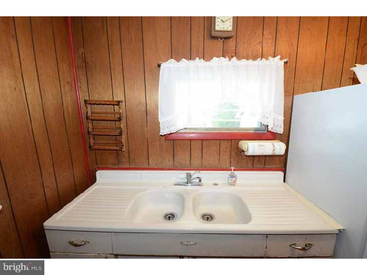 7216 Bradford Road Upper Darby, PA 19082 - Photo 11 of 25 a bathroom with a sink