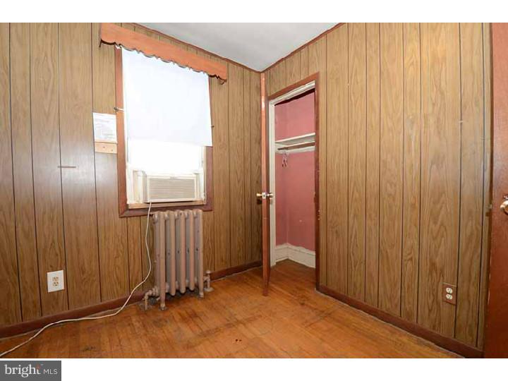 7216 Bradford Road Upper Darby, PA 19082 - Photo 18 of 25 a view of an entryway with a wooden door