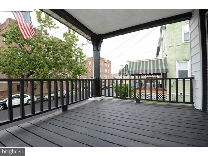 7216 Bradford Road Upper Darby, PA 19082 - Photo 3 of 25 a view of balcony with wooden floor